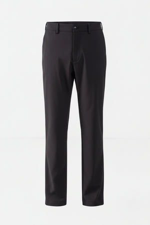 Black pants worn by a person on a white background